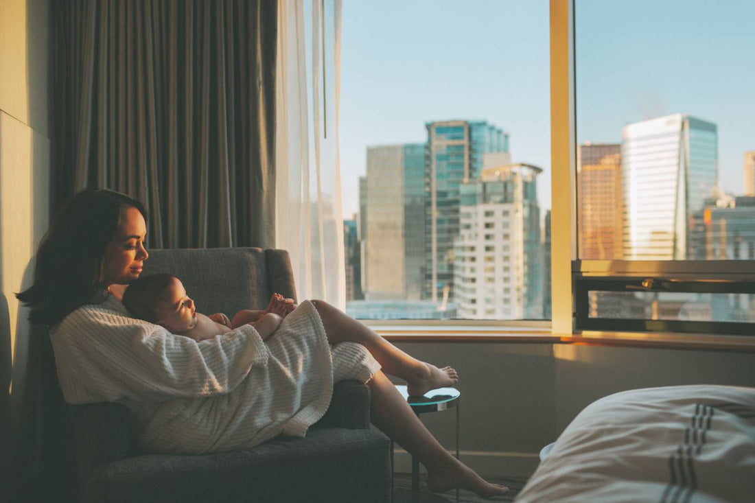 Mum and baby in a hotel room