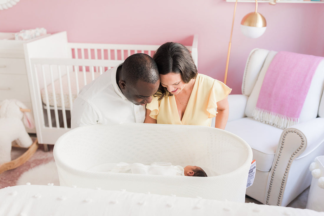 new-parents-with-SNOO-and-baby