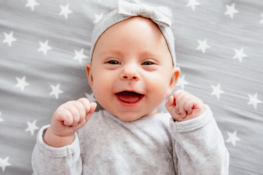 Baby on star sheets