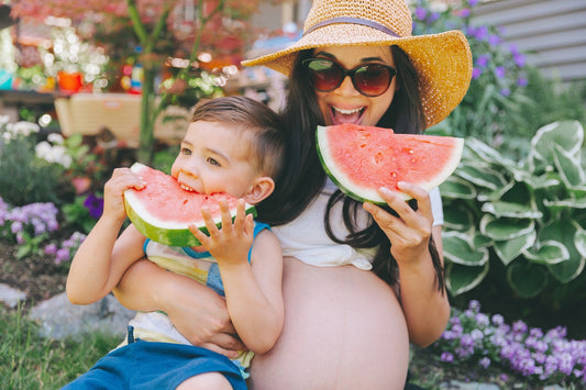 Mum and toddler eating hydrating food