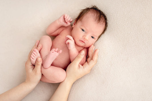 Curled-up newborn